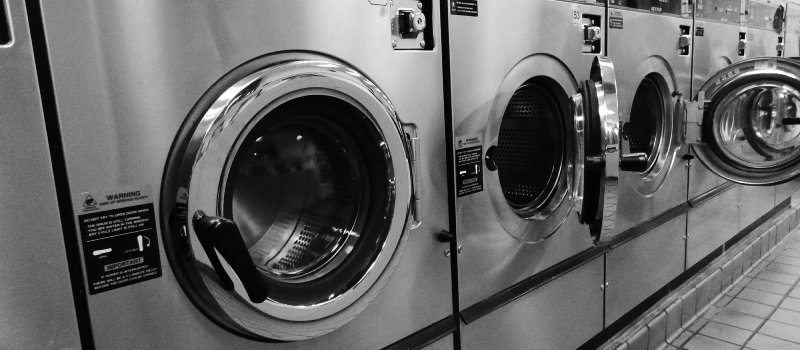 Washing machines in a commerical laundry - Image credit: Aaron Meacham