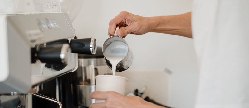 A person making a coffee