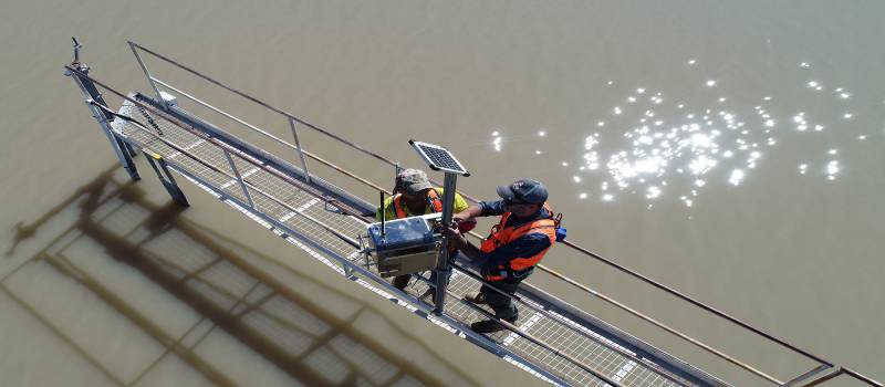 Birdseye view of 2 DQPs installing radar sensor.