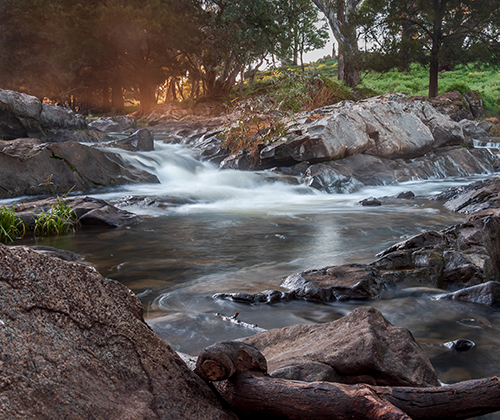 A rocky section of the Belubula River at sunrise.