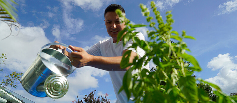 Man with a watering can