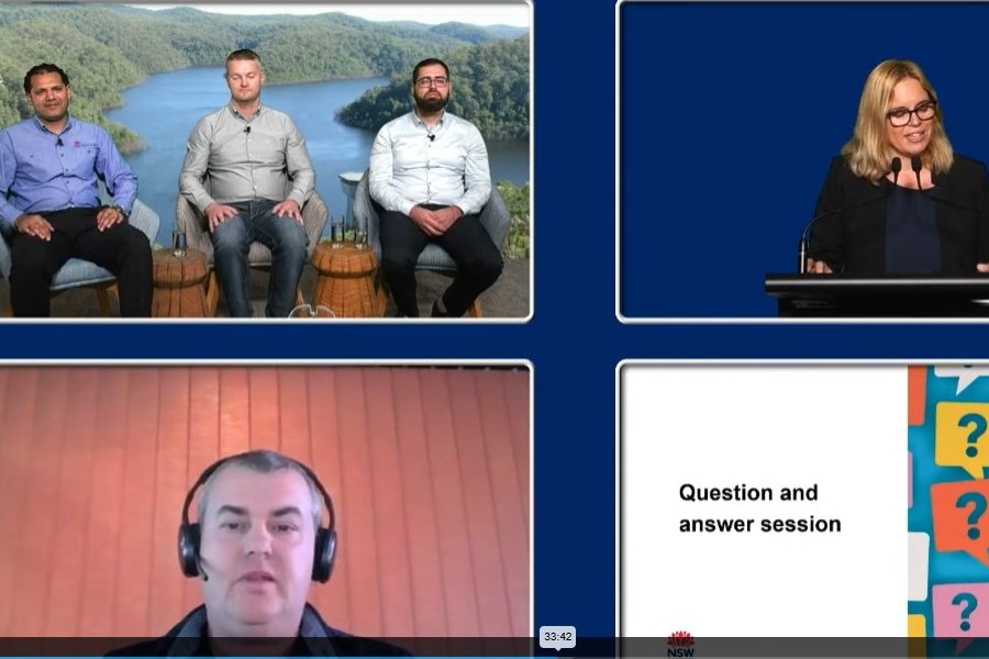 Screen showing 4 views: 3 men sitting on a lounge, one man at computer, a woman at a lecturn and a slide saying Question and Answer Session