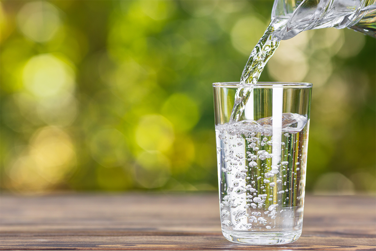water being poured into a drinking glass
